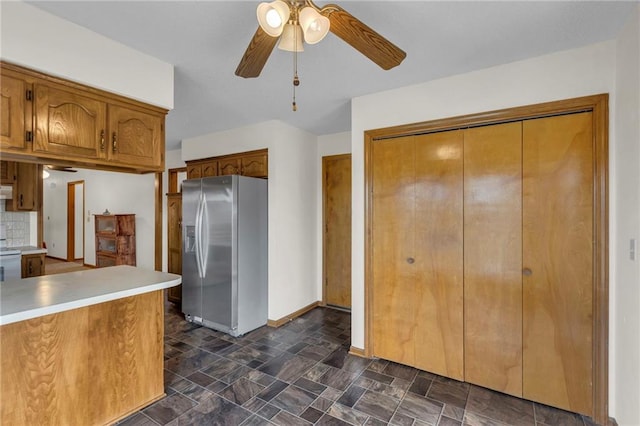 kitchen with stainless steel fridge, ceiling fan, and white range