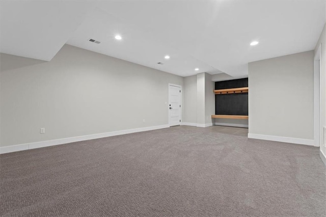 basement featuring carpet