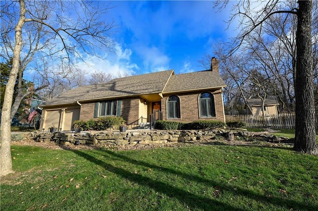 ranch-style home with a garage and a front lawn