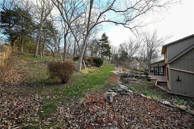 view of yard with a wooden deck