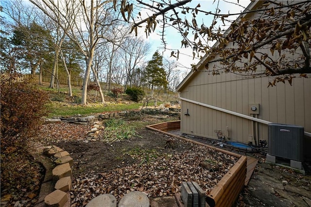 view of yard featuring central AC unit