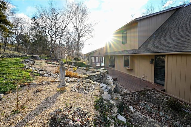 view of yard featuring a wooden deck