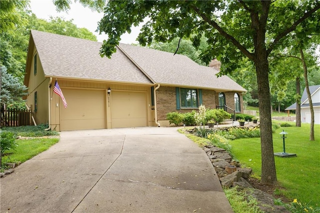 22812 E Bradford Ln, Blue Springs, MO 64015 - view of front facade featuring a garage, driveway, a shingled roof, and a chimney