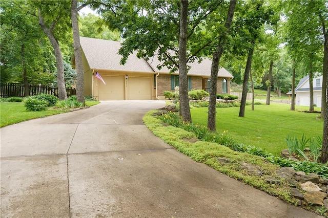 22812 E Bradford Ln, Blue Springs, MO 64015 - view of front of house with a garage, driveway, roof with shingles, and brick siding