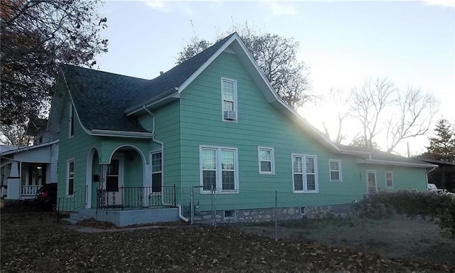 view of property exterior with a porch