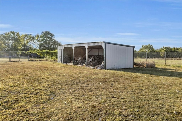 view of outdoor structure with a yard