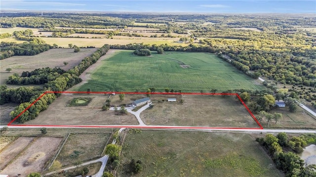 birds eye view of property featuring a rural view