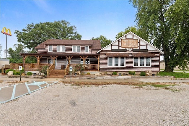 cabin with covered porch