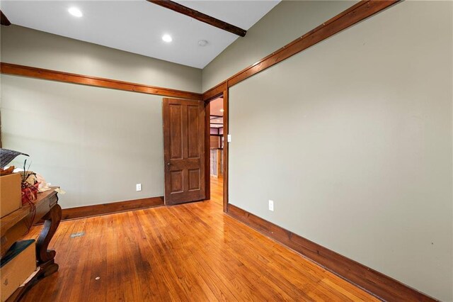 121 W US Highway 40, Odessa, MO 64076 - spare room featuring wood-type flooring and recessed lighting