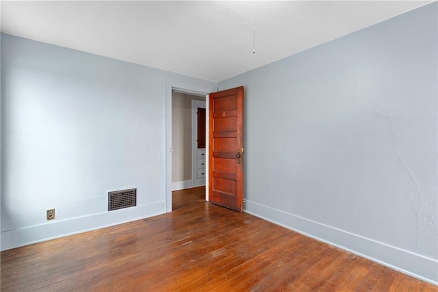 121 W US Highway 40, Odessa, MO 64076 - unfurnished room featuring wood finished floors and baseboards