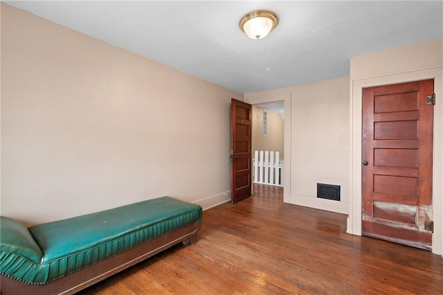 121 W US Highway 40, Odessa, MO 64076 - bedroom featuring wood finished floors and baseboards