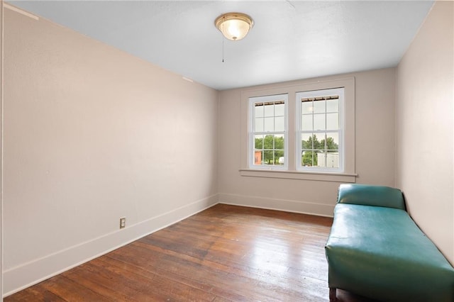 unfurnished room featuring hardwood / wood-style floors