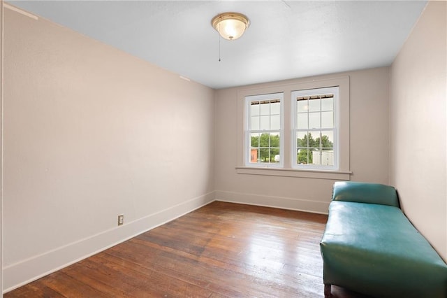 121 W US Highway 40, Odessa, MO 64076 - sitting room featuring baseboards and wood finished floors