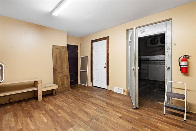 121 W US Highway 40, Odessa, MO 64076 - bedroom featuring wood finished floors and baseboards