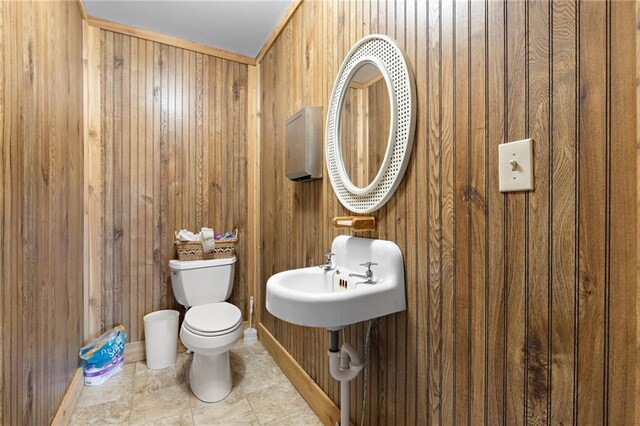121 W US Highway 40, Odessa, MO 64076 - bathroom featuring wooden walls and tile patterned flooring