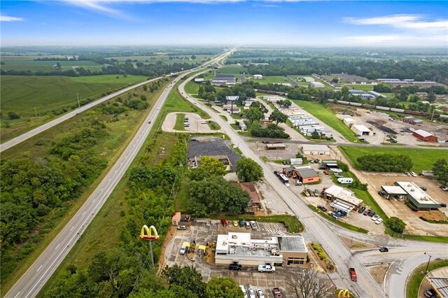 121 W US Highway 40, Odessa, MO 64076 - aerial view of property and surrounding area with a main thoroughfare