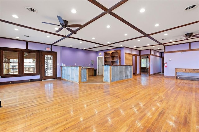 121 W US Highway 40, Odessa, MO 64076 - unfurnished living room with a ceiling fan, recessed lighting, light wood-style flooring, and coffered ceiling