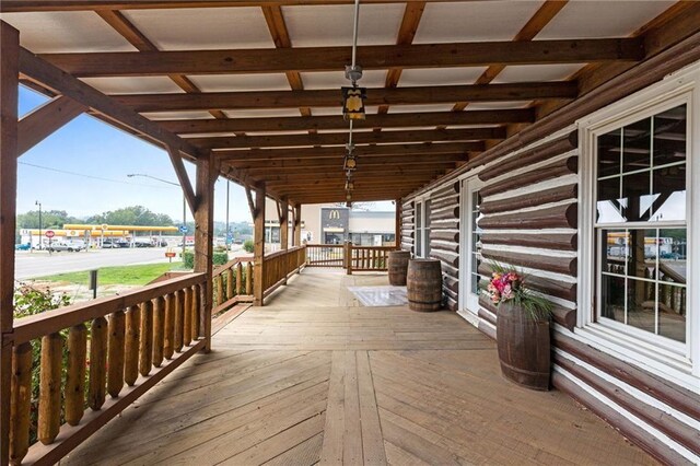 121 W US Highway 40, Odessa, MO 64076 - view of wooden porch