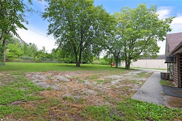 view of yard with central AC