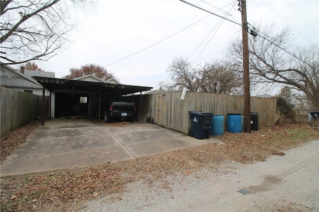 view of home's exterior with a carport