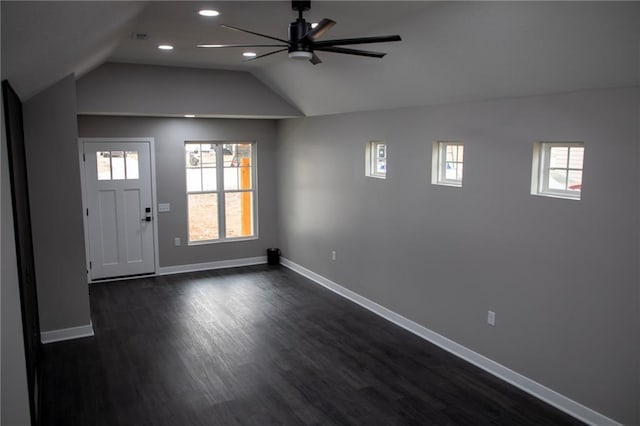 entryway featuring ceiling fan, dark hardwood / wood-style floors, and vaulted ceiling