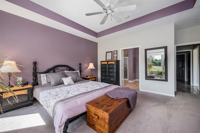 bedroom with ceiling fan and carpet flooring