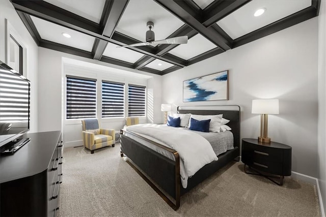 carpeted bedroom featuring beamed ceiling, ceiling fan, and coffered ceiling