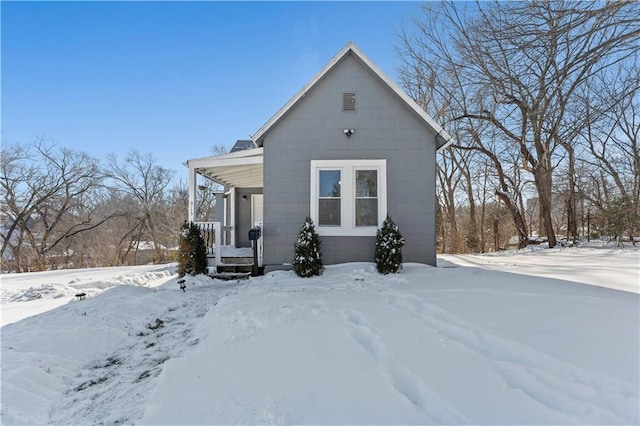 view of snow covered property