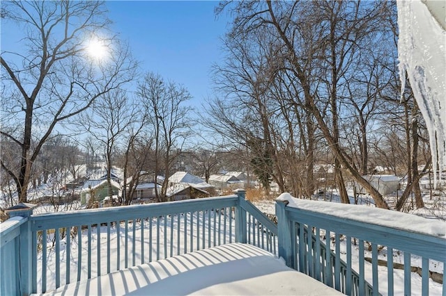 view of snow covered deck