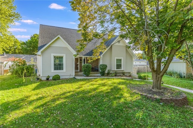 view of front of home with a front yard