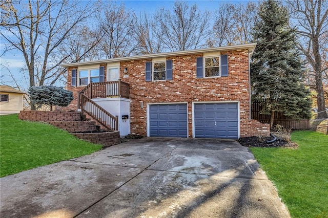 view of front of property with a front yard and a garage