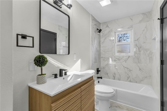 full bathroom with toilet, vanity, and tiled shower / bath combo