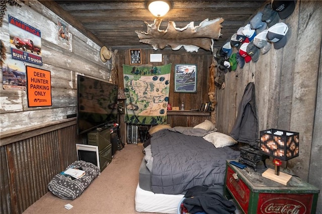 carpeted bedroom featuring wood ceiling