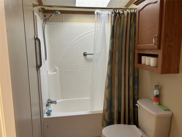 bathroom with shower / bath combination with curtain and toilet