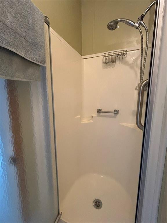 bathroom with a shower