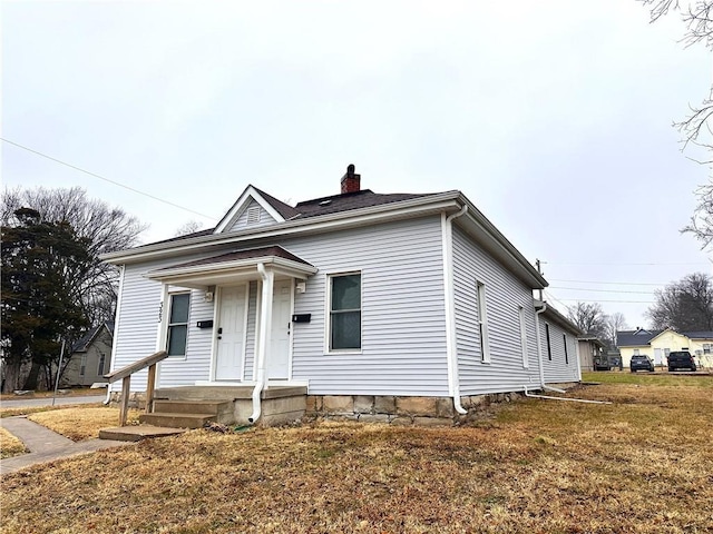 bungalow with a front lawn