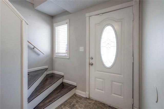 foyer entrance featuring a wealth of natural light