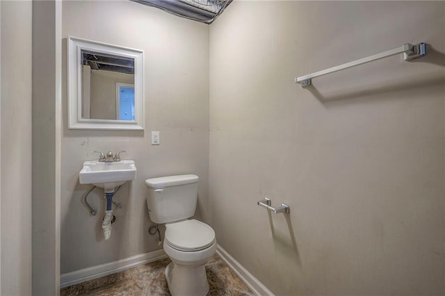 bathroom featuring toilet