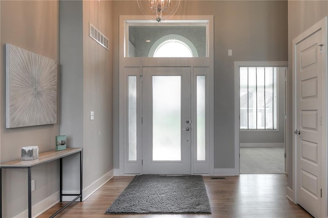 foyer with light hardwood / wood-style floors