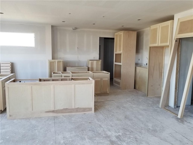 kitchen with light brown cabinetry