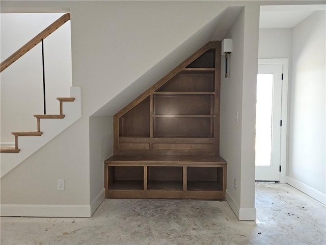 14608 Aspen Cir, Basehor, KS 66007 - staircase featuring baseboards and unfinished concrete flooring