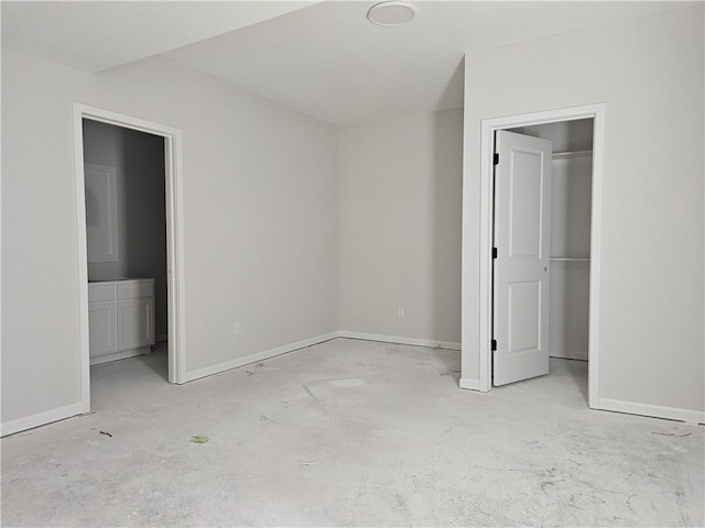 14608 Aspen Cir, Basehor, KS 66007 - unfurnished bedroom with a spacious closet, baseboards, and connected bathroom