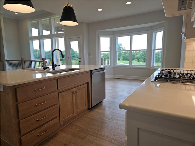 14608 Aspen Cir, Basehor, KS 66007 - kitchen featuring appliances with stainless steel finishes, light wood finished floors, plenty of natural light, and recessed lighting