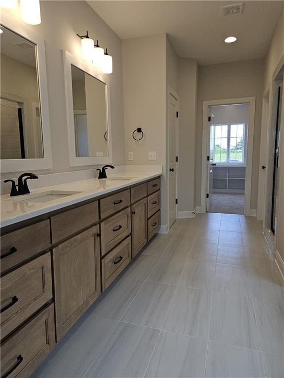 14608 Aspen Cir, Basehor, KS 66007 - full bath featuring double vanity and tile patterned floors