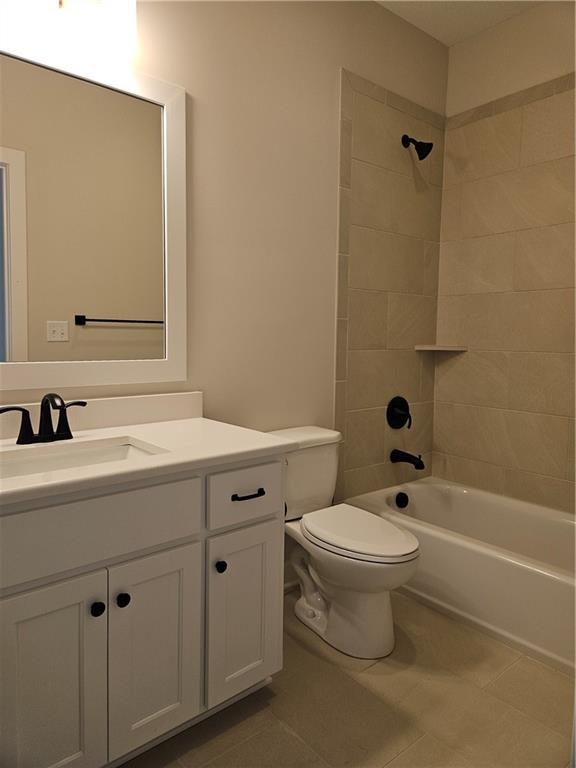 14608 Aspen Cir, Basehor, KS 66007 - full bath with vanity, tile patterned flooring, and shower / tub combination