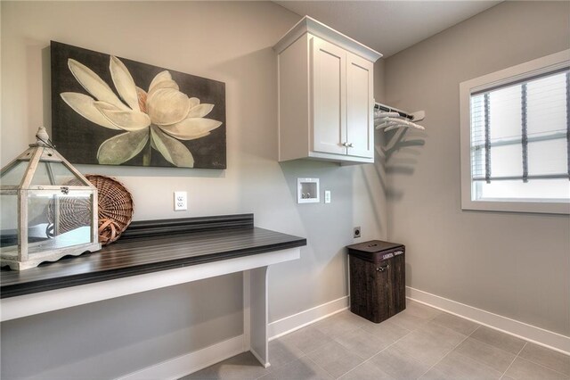 14608 Aspen Cir, Basehor, KS 66007 - laundry room featuring cabinet space, electric dryer hookup, hookup for a washing machine, and light tile patterned floors