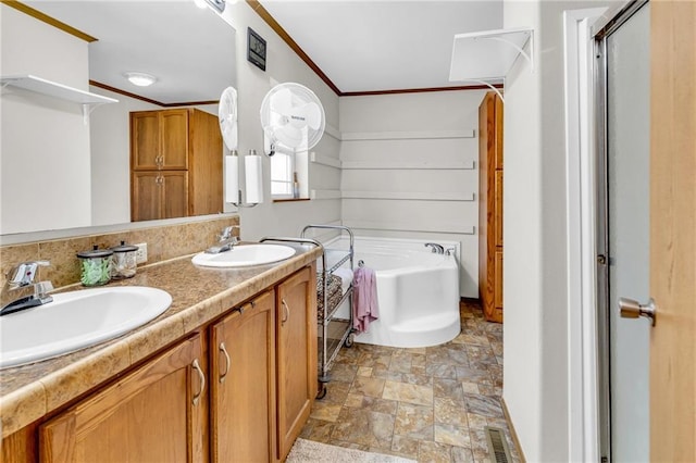 bathroom featuring plus walk in shower, vanity, and ornamental molding