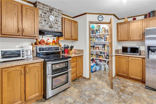 kitchen with exhaust hood, ornamental molding, and appliances with stainless steel finishes