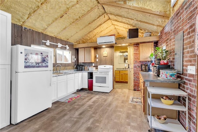 kitchen featuring light wood-type flooring, brick wall, white appliances, white cabinets, and vaulted ceiling with beams