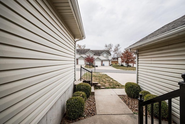 view of side of property featuring a garage